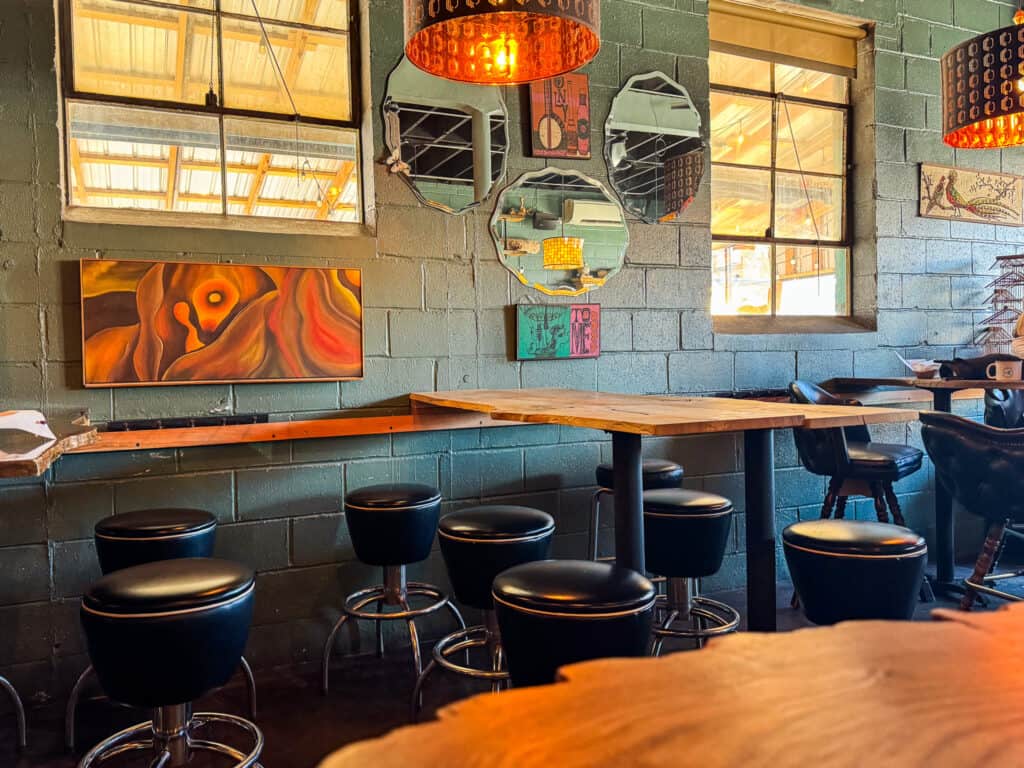 brewery emperial in crossroads arts district is ecelctic with blue walls and artsy decor