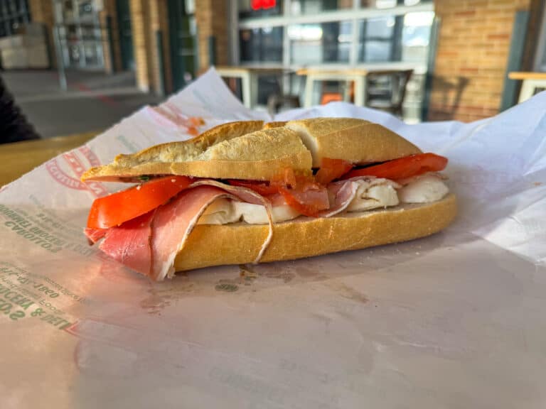 carollos sandwich on italian bread with tomato mozarella and proscuitto in kansas city