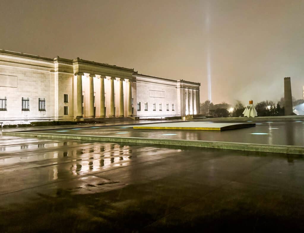 nelson atkins museum of art in kansas city at nighttime on a cloudy night
